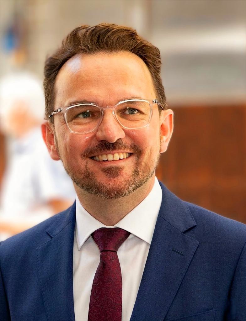Porträt von Dr. iur. Tim Oliver Köbrich
